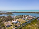 You've earned this. Nestled in the heart of Cape Haze and ONLY 4 for sale in Placida Florida Charlotte County County on GolfHomes.com