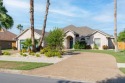 Explore this stunning home in the gated SPI Golf Community--a for sale in Laguna Vista Texas Cameron County County on GolfHomes.com