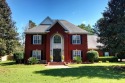 This lovely two-story brick home is located in The Highlands on for sale in Dothan Alabama Houston County County on GolfHomes.com