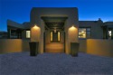 Stateliness, sophistication and luxury describe this spectacular for sale in Santa Fe New Mexico Santa Fe County County on GolfHomes.com