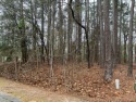 Located in gated Woodlake Country Club, this lot has a golf for sale in Vass North Carolina Moore County County on GolfHomes.com