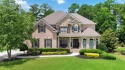Welcome to this luxurious 5-bedroom, 4-bathroom estate nestled for sale in Dacula Georgia Gwinnett County County on GolfHomes.com