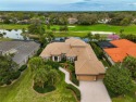 Luxury, comfort and views converge!  This captivating LAKEFRONT for sale in Nokomis Florida Sarasota County County on GolfHomes.com
