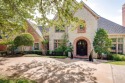 Elegant French manor located on a two acre corner lot in the for sale in Flower Mound Texas Denton County County on GolfHomes.com