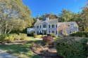 This spacious colonial style home sits nicely on a quiet for sale in Mashpee Massachusetts Barnstable County County on GolfHomes.com