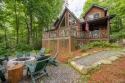 Welcome to Whisper Wood Lodge and escape the ordinary to this for sale in Sapphire North Carolina Transylvania County County on GolfHomes.com