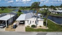 Welcome Home to 767 Queensway Rd S in award winning Maple Leaf for sale in Port Charlotte Florida Charlotte County County on GolfHomes.com