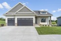 This beautiful Hodge Construction built home overlooks for sale in Solon Iowa Johnson County County on GolfHomes.com