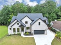 Step into an architectural masterpiece in the prestigious Indian for sale in Marietta Georgia Cobb County County on GolfHomes.com