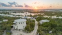 This two story 3 bedroom/ 2 bath house sits only steps from The for sale in   Caicos Islands County on GolfHomes.com