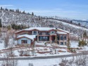 Enjoy one of the best possible viewpoints in upper Jeremy Ranch for sale in Park City Utah Summit County County on GolfHomes.com