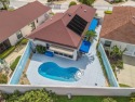 *DREAM POOL HOME in the Village of Rio Grande, Villa De La Mesa for sale in Lady Lake Florida Sumter County County on GolfHomes.com