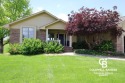 Enjoy peaceful evenings on your covered back deck overlooking for sale in Garden City Kansas Finney County County on GolfHomes.com