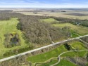 Nestled across from Minnee Monesse Golf Course, this 12-acre for sale in Grant Park Illinois Kankakee County County on GolfHomes.com