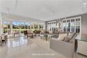 Gallery-inspired design meets effortless livability in this for sale in Bonita Springs Florida Lee County County on GolfHomes.com