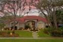 YOUR PRIVATE OASIS IN TUSCAWILLA. This elegant Glen Eagle custom for sale in Winter Springs Florida Seminole County County on GolfHomes.com