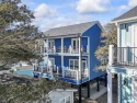 Discover the epitome of coastal luxury with this rare 4-bedroom for sale in Myrtle Beach South Carolina Horry County County on GolfHomes.com