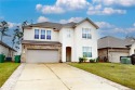 Nestled on a serene golf course, this stunning two-story home for sale in Westlake Louisiana Calcasieu Parish County on GolfHomes.com