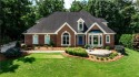 Stunning 3 Sided Brick Home in Foxhall, Exclusive Golf, Swim and for sale in Roswell Georgia Fulton County County on GolfHomes.com