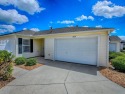 Bond Paid and exceptional Living awaits in this stylish for sale in The Villages Florida Lake County County on GolfHomes.com