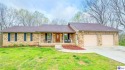 Welcome home to this charming brick ranch nestled in a desirable for sale in Greensburg Kentucky Green County County on GolfHomes.com