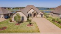 This GORGEOUS home with extraordinary drive-up appeal is located for sale in Granbury Texas Hood County County on GolfHomes.com