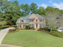 Nestled in Edgewater, this classic Wieland-built home is a for sale in Lawrenceville Georgia Gwinnett County County on GolfHomes.com