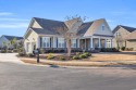 Welcome to this meticulously maintained 4-bedroom, 3-bathroom for sale in North Myrtle Beach South Carolina Horry County County on GolfHomes.com