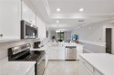 This Treviso Bay 1st floor lake side condo is resort-style for sale in Naples Florida Collier County County on GolfHomes.com