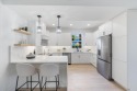 Discover a refined take on modern living in this fully renovated for sale in Boca Raton Florida Palm Beach County County on GolfHomes.com