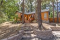 Nestled among the trees in Moonridge, this charming cabin is for sale in Big Bear Lake California San Bernardino County County on GolfHomes.com