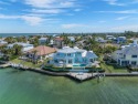 Nestled at the northern-most point in the picturesque shores of for sale in Holmes Beach Florida Manatee County County on GolfHomes.com
