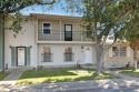 This delightful townhome offers a comfortable two-story layout for sale in Harlingen Texas Cameron County County on GolfHomes.com