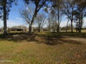 Large lot with golf course frontage, located just behind the #8 for sale in New Iberia Louisiana Iberia Parish County on GolfHomes.com