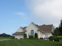 This exceptional home overlooks the 14th hole and beautiful lake for sale in Laurel Fork Virginia Carroll County County on GolfHomes.com