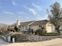 Welcome to this charming single-story home in the private, gated for sale in El Cajon California San Diego County County on GolfHomes.com