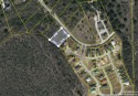 This 0.879-acre lot, nestled within an exclusive gated golf for sale in San Antonio Texas Bexar County County on GolfHomes.com