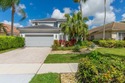 Stunning builder's model home located in the beautiful community for sale in Lake Worth Florida Palm Beach County County on GolfHomes.com