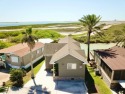 It's all about the views from this beautiful cottage home! First for sale in Port Isabel Texas Cameron County County on GolfHomes.com