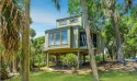 This pristinely renovated resort-style beach house in Wyndham for sale in Edisto Island South Carolina Colleton County County on GolfHomes.com