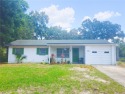 Location and Price with a garage and a pool.  They say that for sale in Sanford Florida Seminole County County on GolfHomes.com