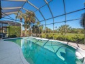 Private beach club memberships available on pristine Bonita for sale in Fort Myers Florida Lee County County on GolfHomes.com