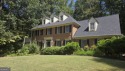 Nestled in the highly desirable Brookfield Country Club for sale in Roswell Georgia Fulton County County on GolfHomes.com