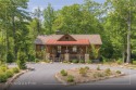 Discover the perfect mountain retreat with this charming for sale in Glenville North Carolina Jackson County County on GolfHomes.com