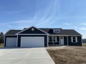 Discover the epitome of modern living in this new-construction for sale in Three Rivers Michigan St. Joseph County County on GolfHomes.com
