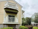 Beautiful first-floor villa featuring a private deck with serene for sale in Bluffton South Carolina Beaufort County County on GolfHomes.com
