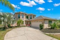 This former builder's model home with 5 bedrooms, 3 bathrooms for sale in Tarpon Springs Florida Pinellas County County on GolfHomes.com