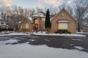 Location, location, location! This five-bedroom, four-full-bath for sale in Highland Michigan Oakland County County on GolfHomes.com