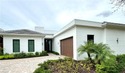 Stunning custom residence offering picturesque lake and for sale in Miromar Lakes Florida Lee County County on GolfHomes.com