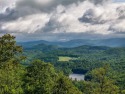 Poised on a quiet cul-de-sac in the prestigious, gated community for sale in Cashiers North Carolina Jackson County County on GolfHomes.com